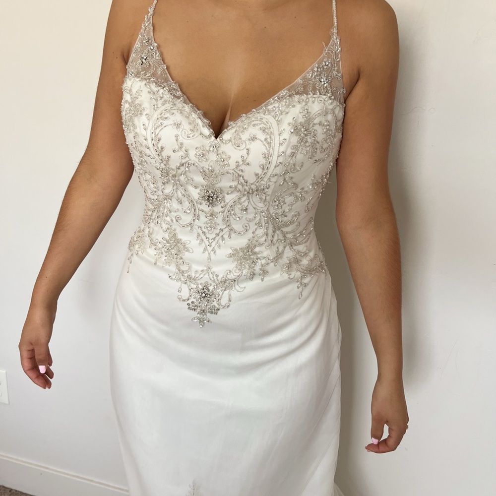 Elegant White Beaded Wedding Dress - Picture 4 of 7